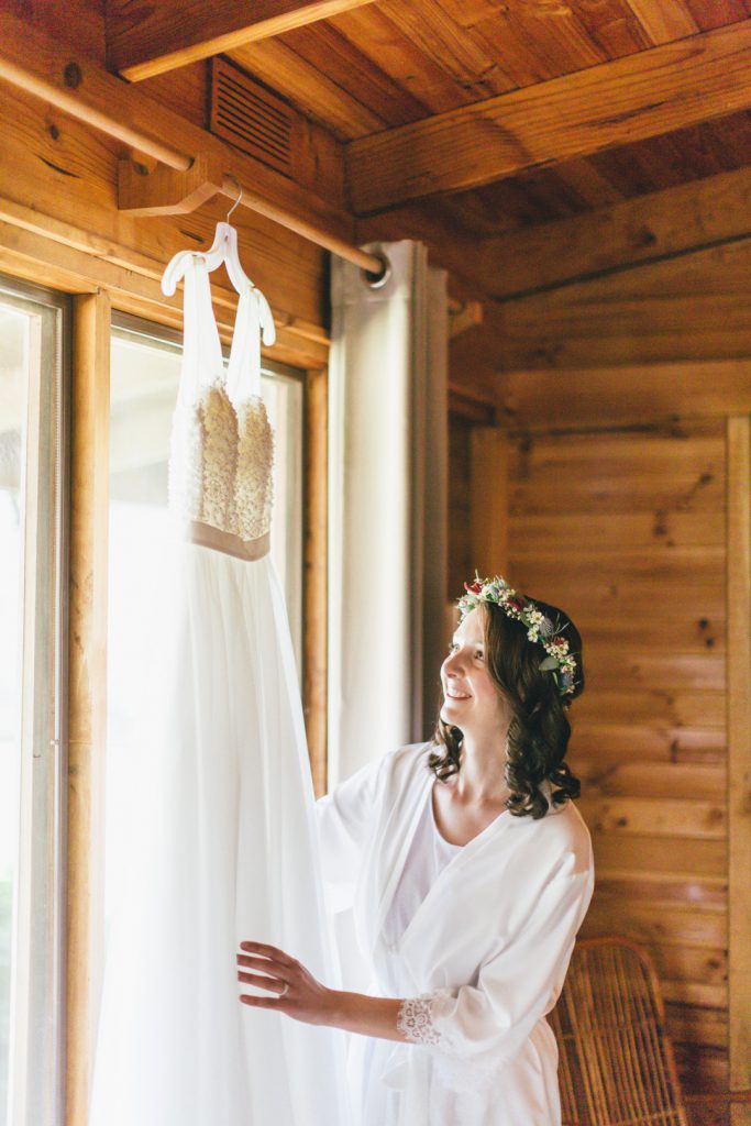 Bride posing with her wedding dress during getting ready for the Gunyah Valley wedding.