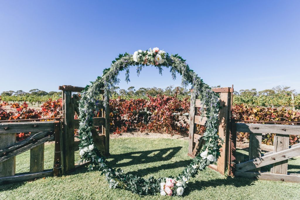 Beautiful circle arch for wedding ceremony at Norton Estate wedding.
