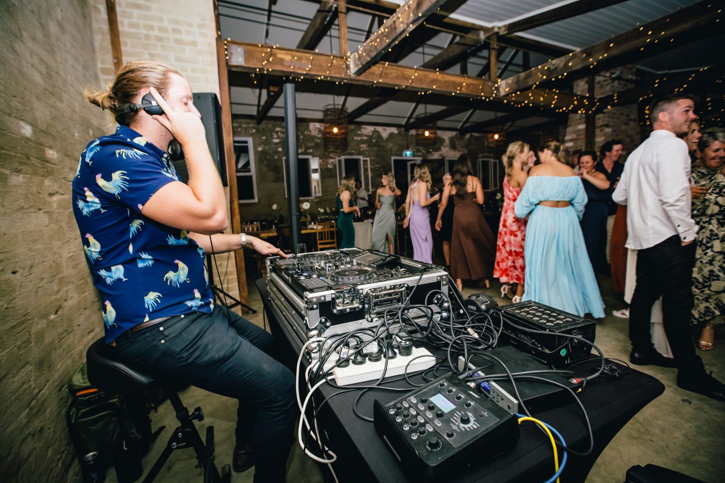 A DJ performing at a wedding