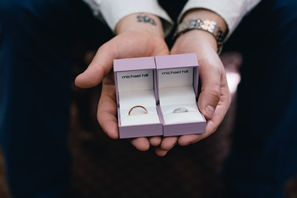 Wedding rings before wedding ceremony.