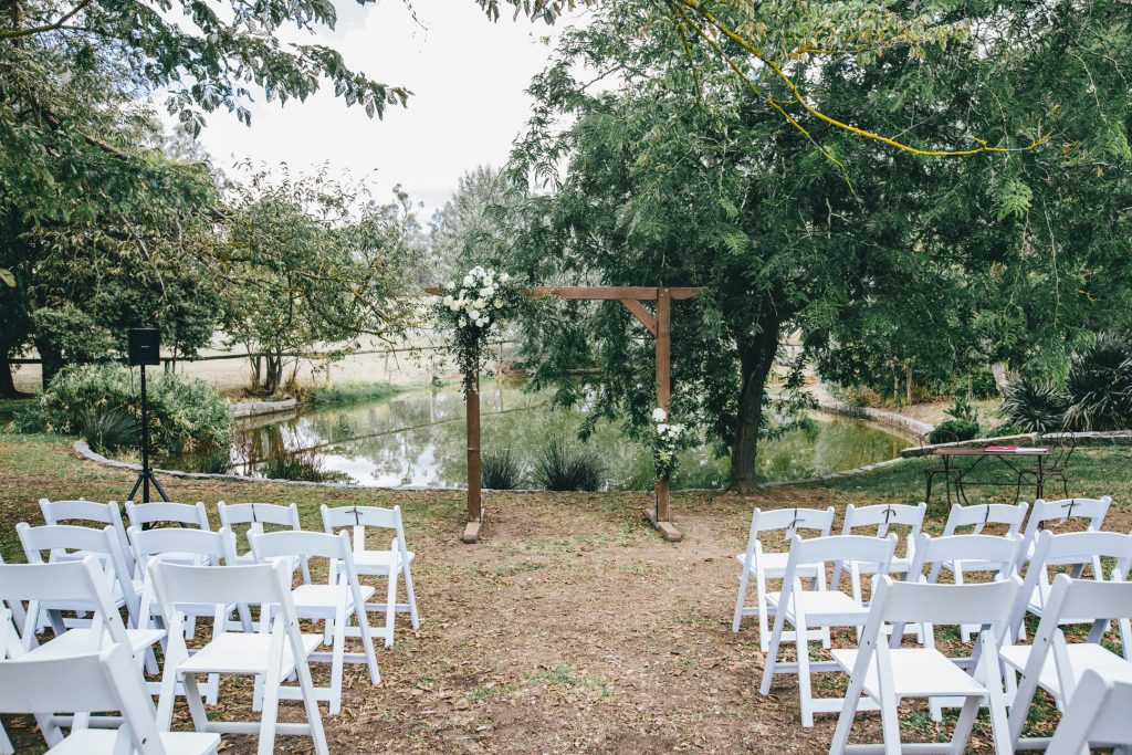 Rustic wooden wedding arch for ceremony at Ravenswood Homestead Wedding.