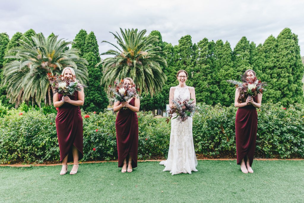 Bride and her bridesmaids with their stunning native Australian bouquets for Farm Vigano South Morang wedding..