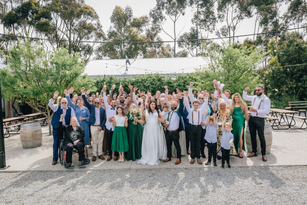 Bride and groom group photo with all the guests at Rocklea Farm Stonehaven.